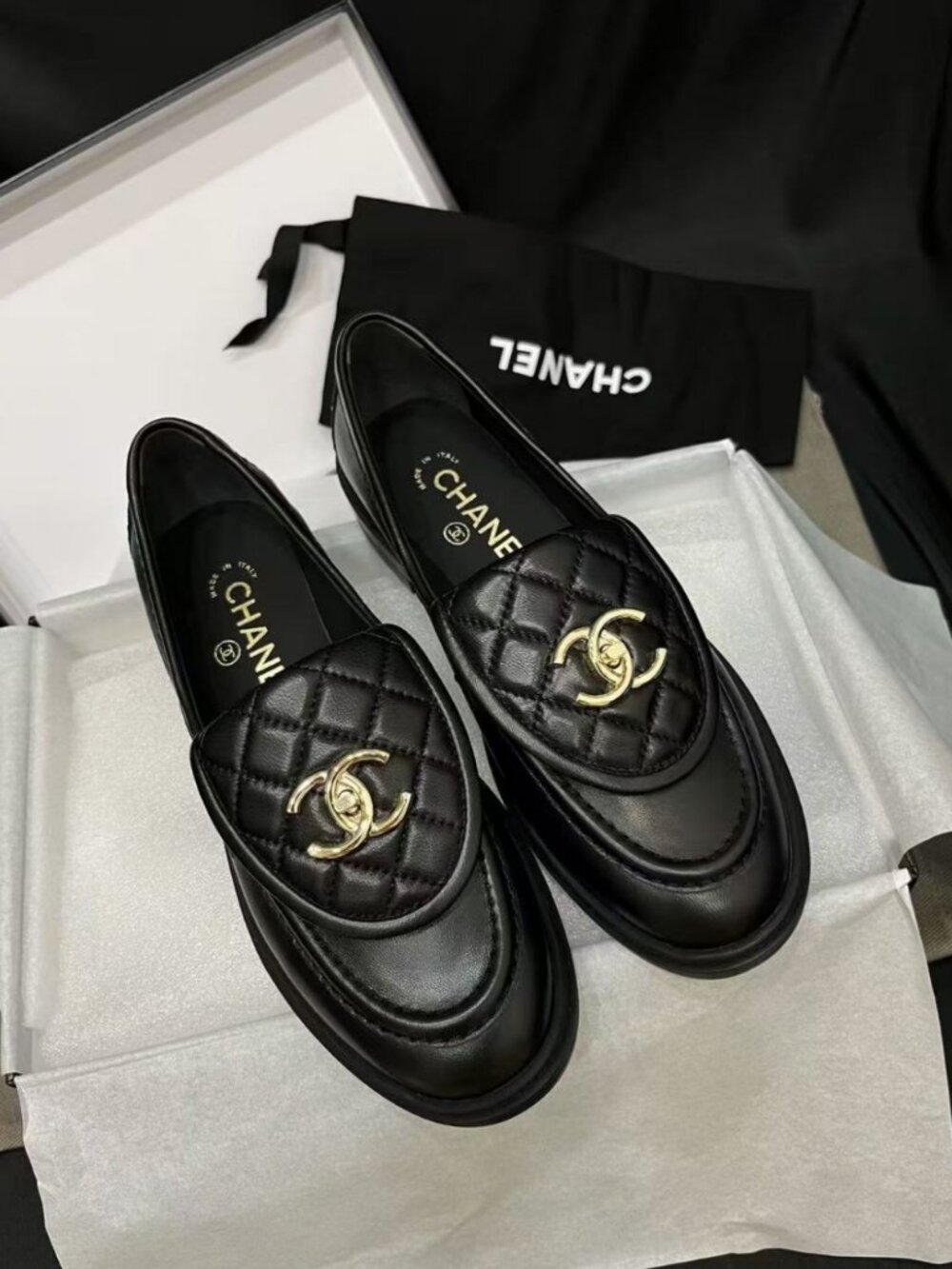 CHANEL black flap‑design loafers